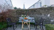 The perfect front garden spot to enjoy a vino or your morning brew whilst watching the coming and goings of village life.