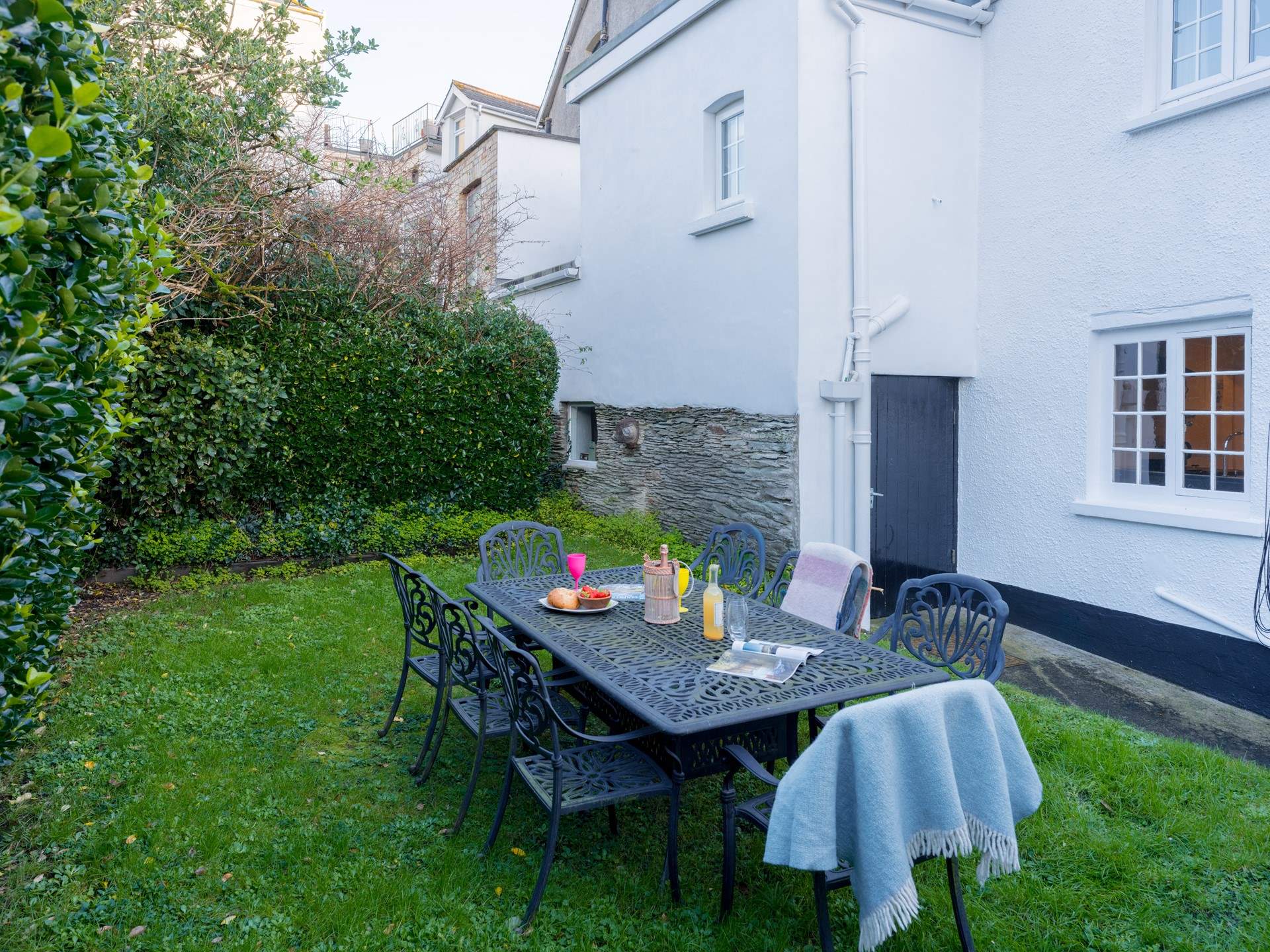 On warmer evenings, enjoy al fresco dining in the back garden.