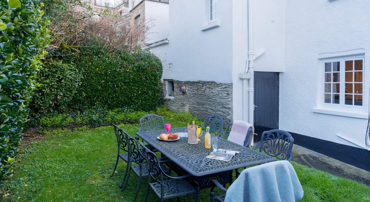 On warmer evenings, enjoy al fresco dining in the back garden.
