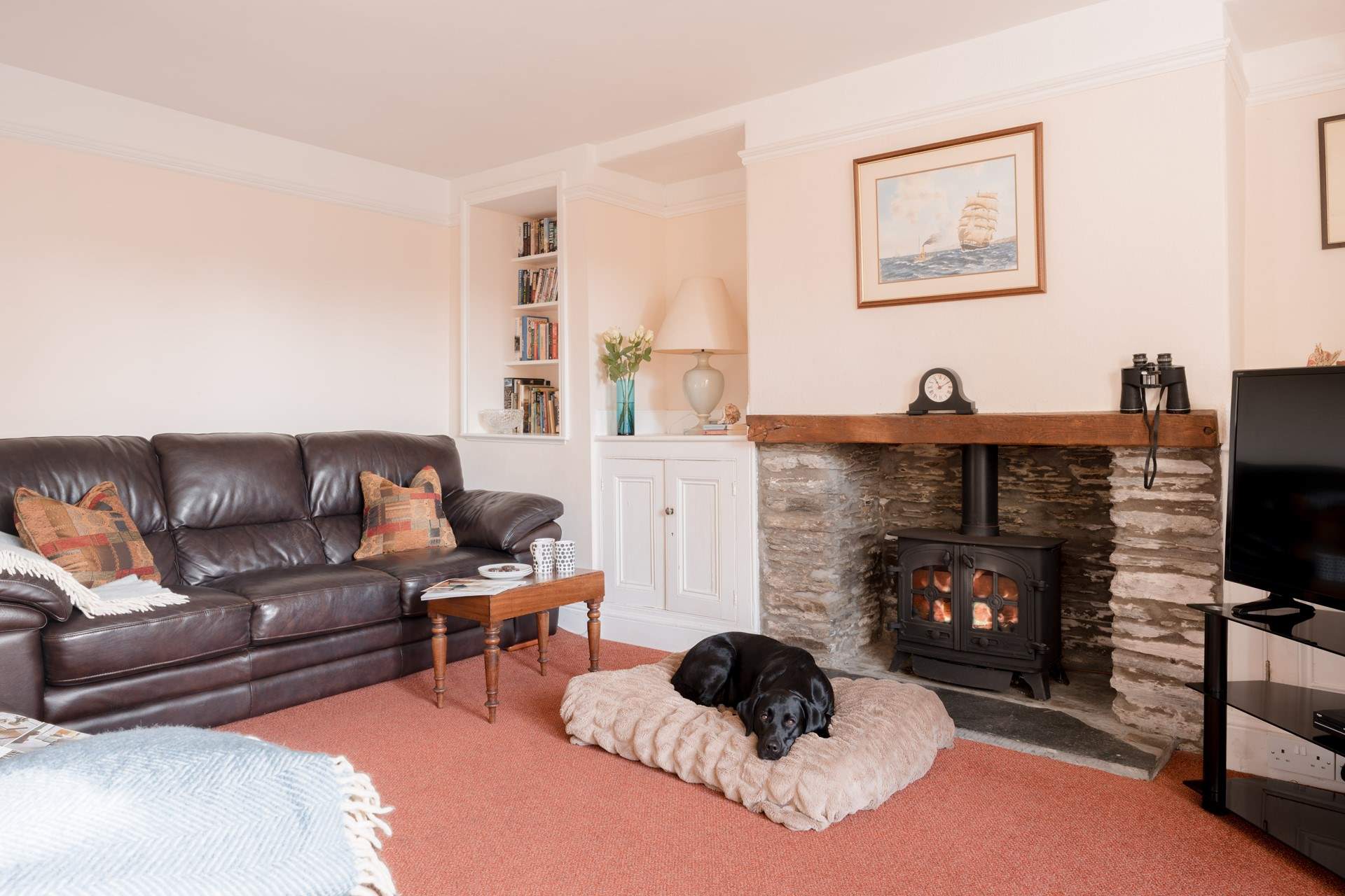 The traditional sitting-room offers the perfect spot to relax. 