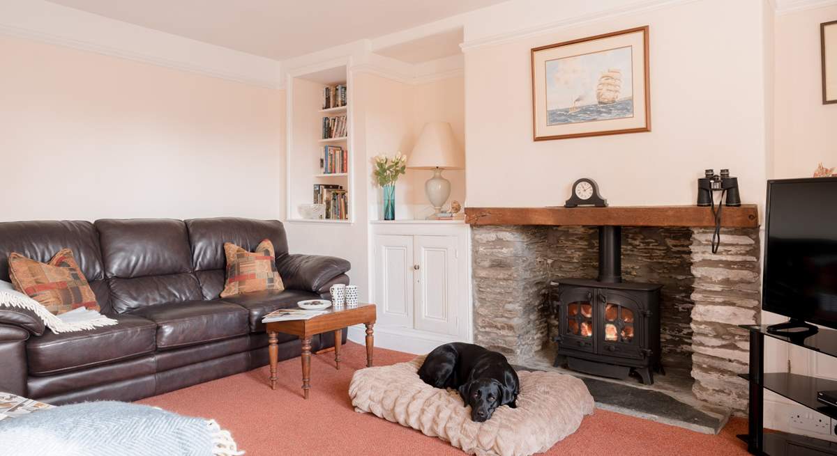 The traditional sitting-room offers the perfect spot to relax. 