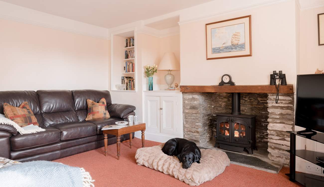 The traditional sitting-room offers the perfect spot to relax. 