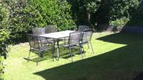 On warmer evenings, enjoy al fresco dining in the back garden.