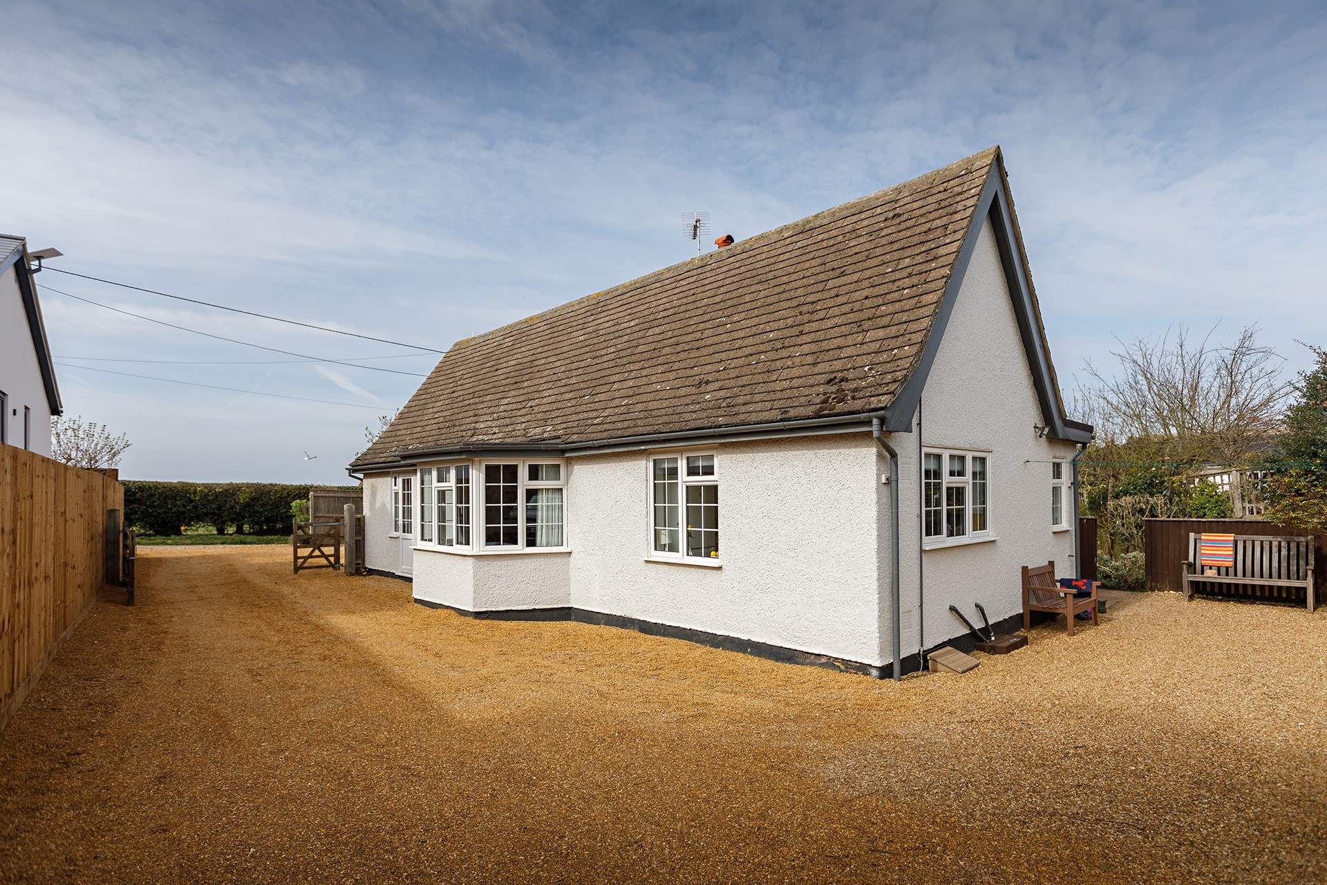 There is ample parking on the shingled driveway at Dormy House.