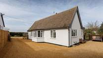 There is ample parking on the shingled driveway at Dormy House.