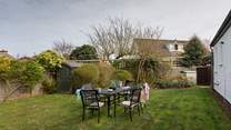 The enclosed garden is perfect for al fresco dining.