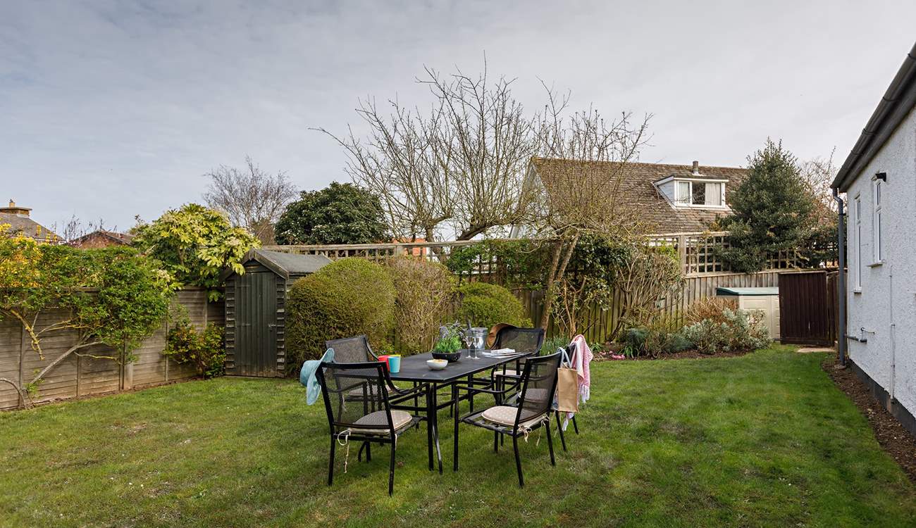 The enclosed garden is perfect for al fresco dining.
