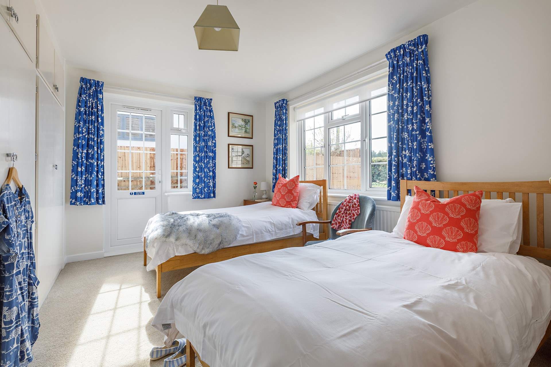 The light-filled, dual-aspect twin bedroom. 
