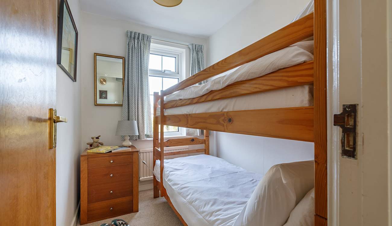 Little ones will love resting their weary heads in the bunk room.