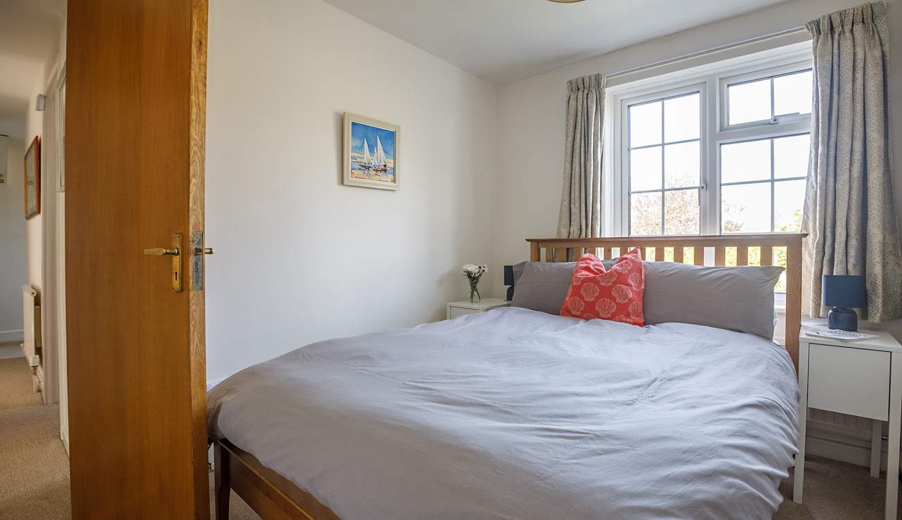 The double bedroom has ample storage so unpack your suitcases and unwind fully.