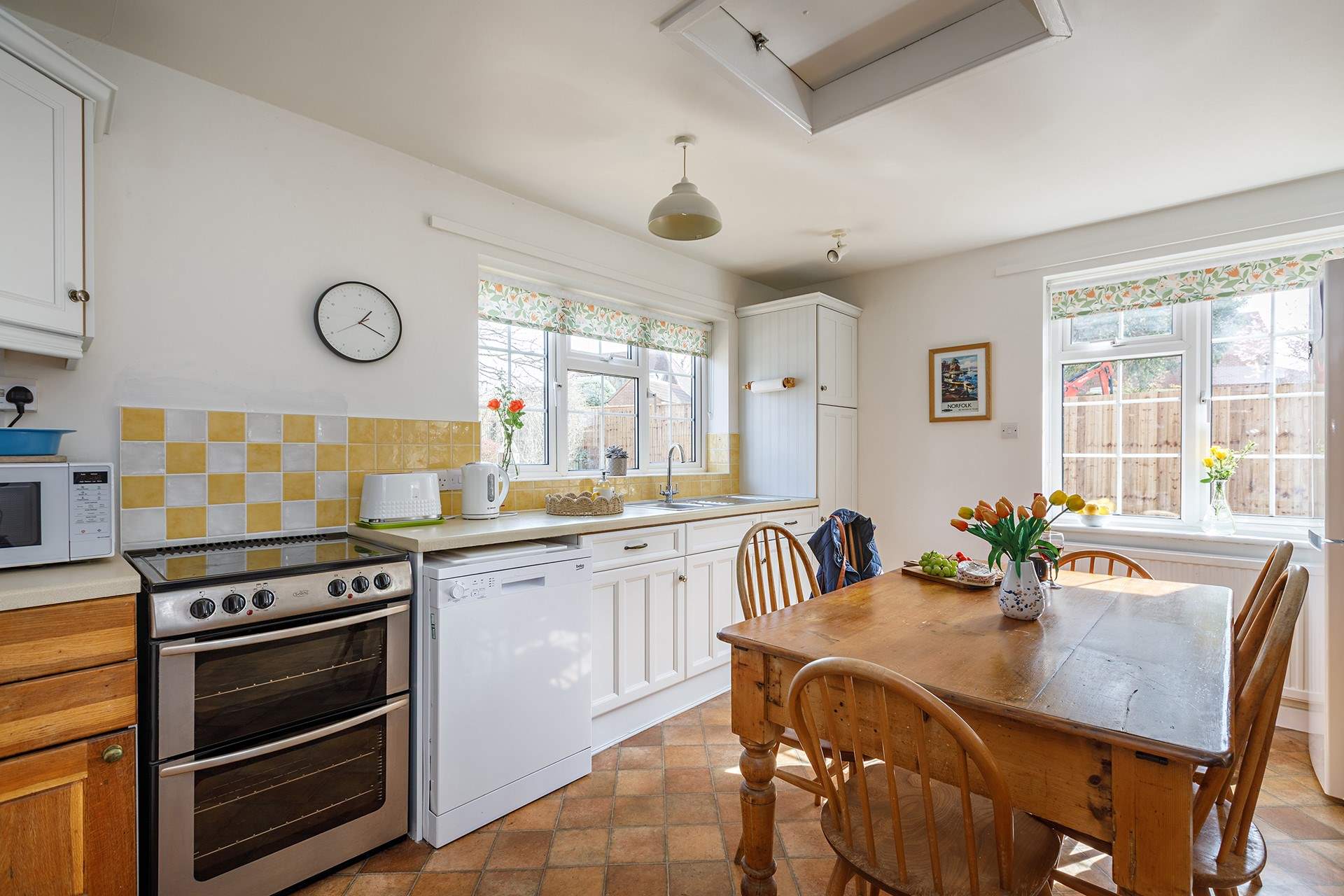 The light floods into the dual-aspect kitchen.