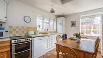 The light floods into the dual-aspect kitchen.