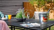 Chill out in the garden whilst the kids hit the beach!