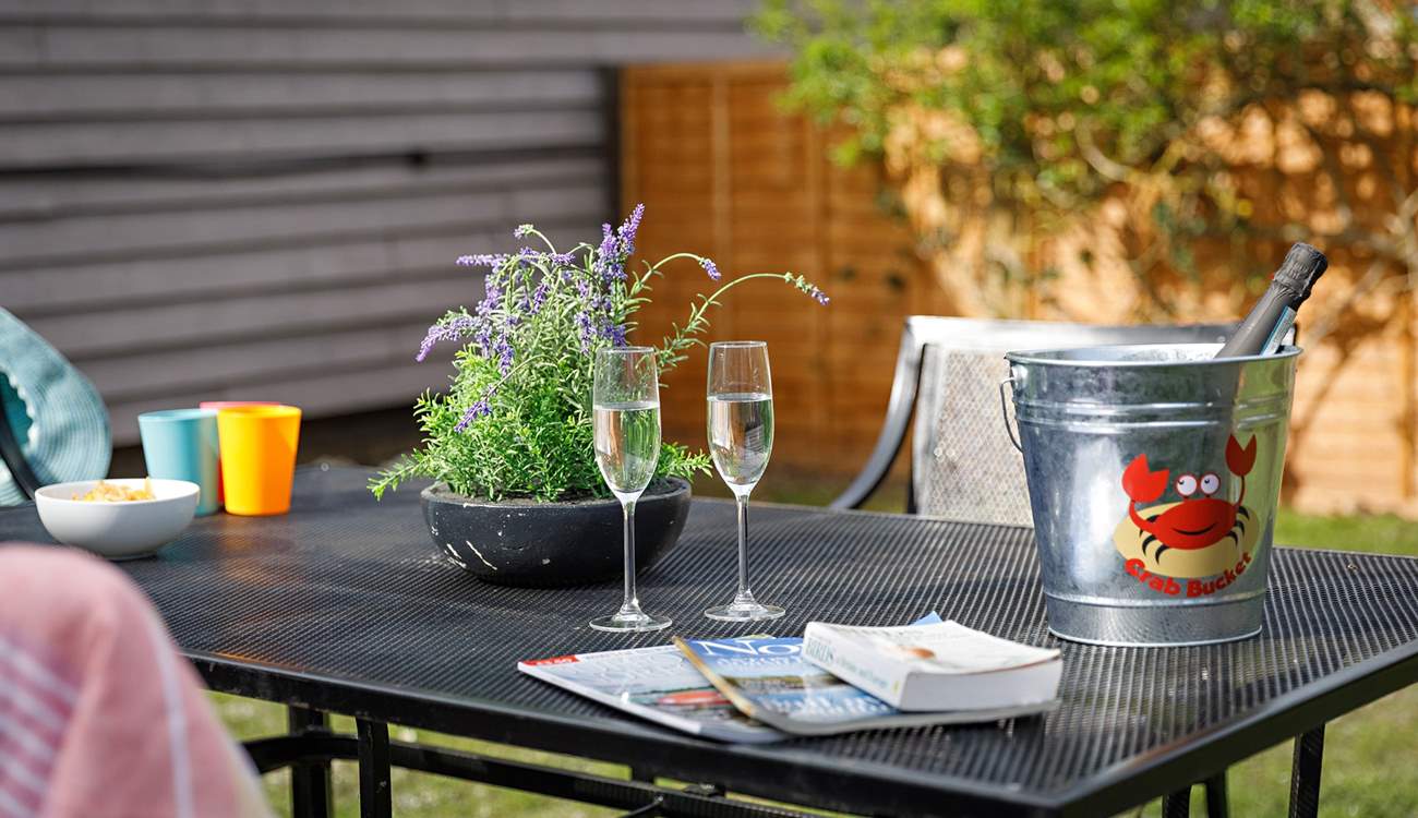 Chill out in the garden whilst the kids hit the beach!