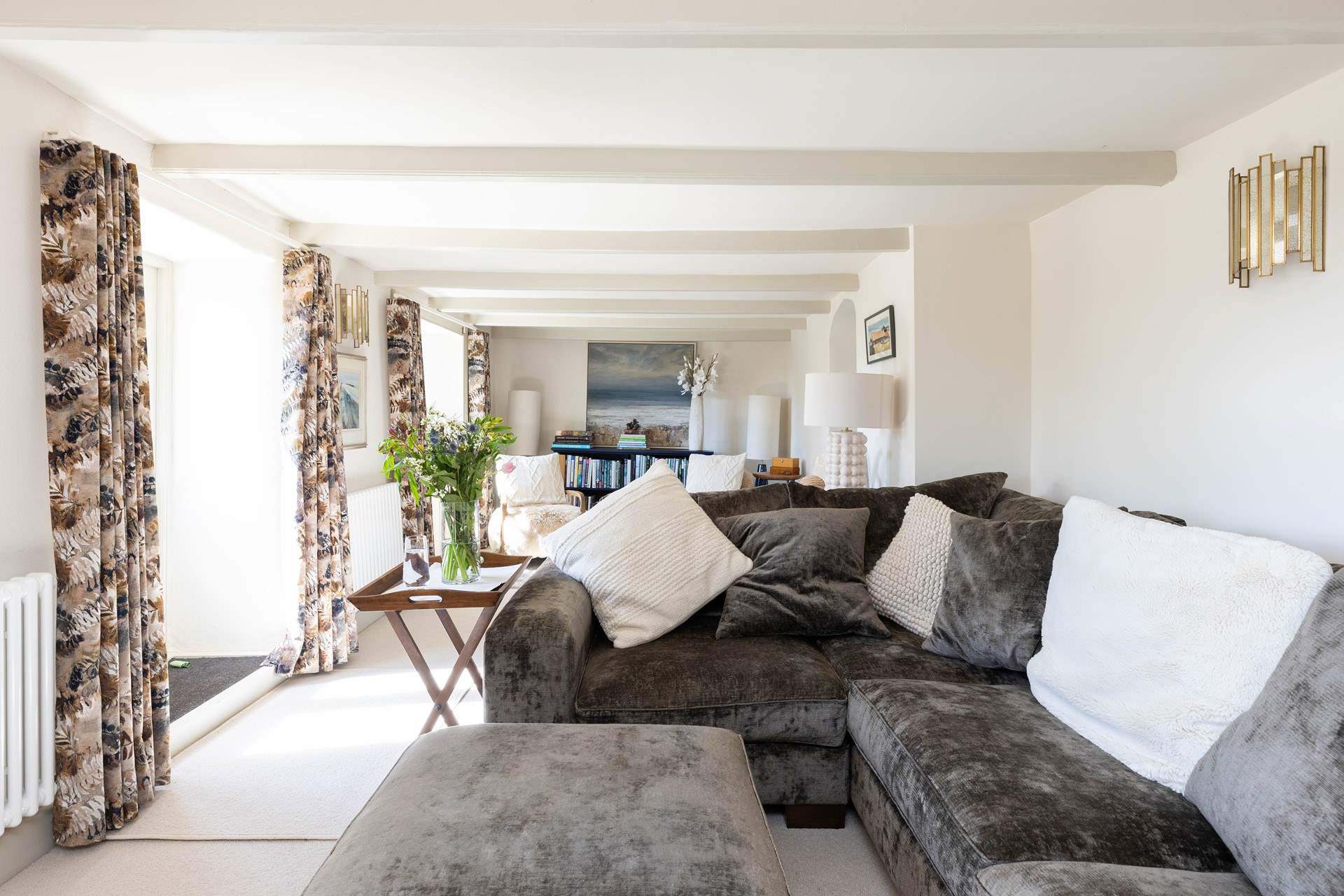 The large velvet sofa is just inviting you to relax. 