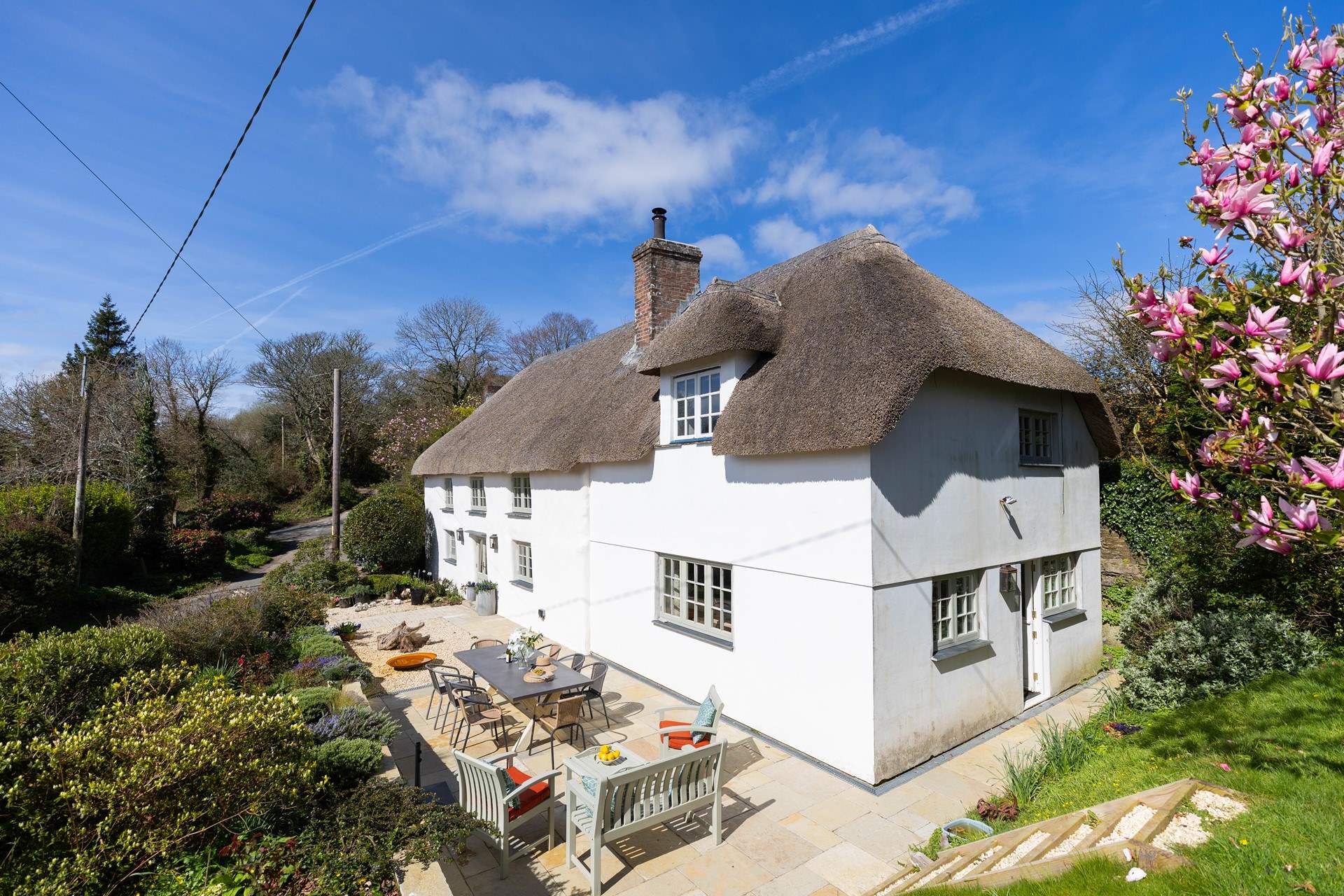 The large patio spans the front of the house. 