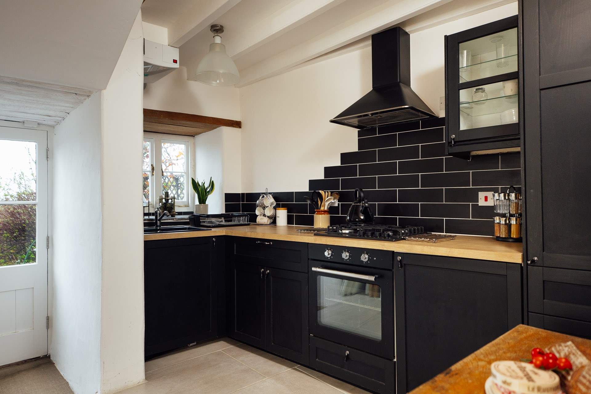 The stylish kitchen has all you need for some delicious cooking.  