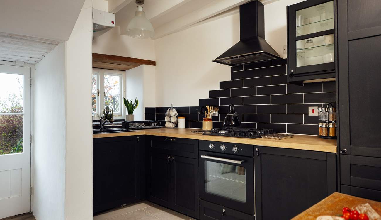 The stylish kitchen has all you need for some delicious cooking.  