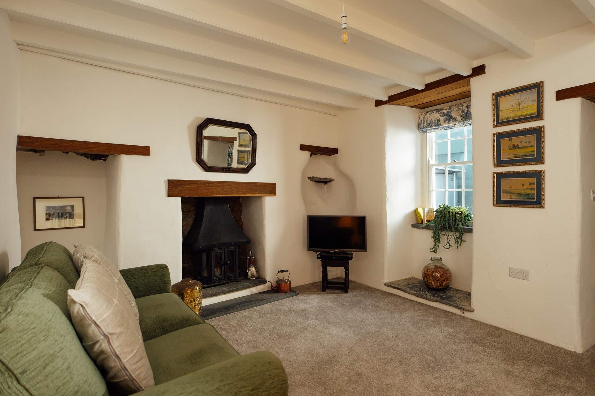 Cwtch (snuggle up) on the comfy sofa and relax, away from it all. 