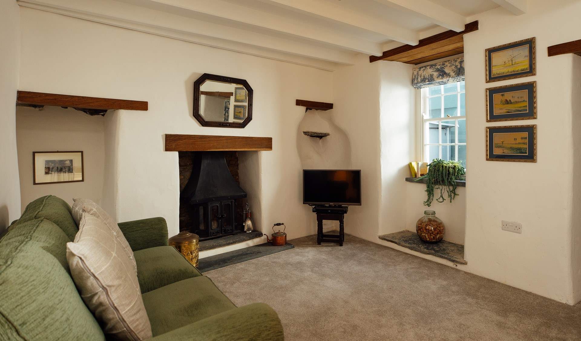 Cwtch (snuggle up) on the comfy sofa and relax, away from it all. 