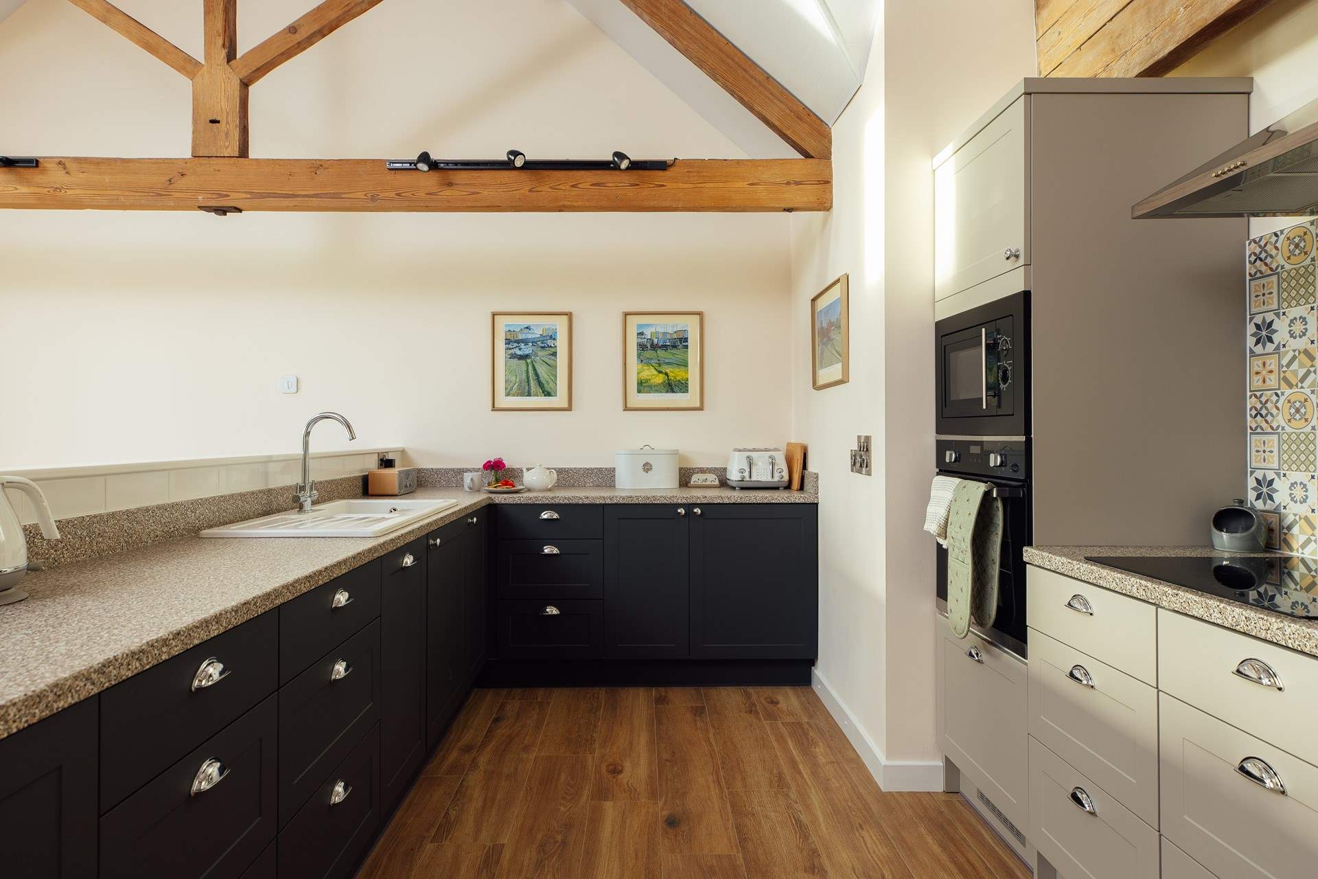 The sleek, modern, well-equipped kitchen is a joy. 