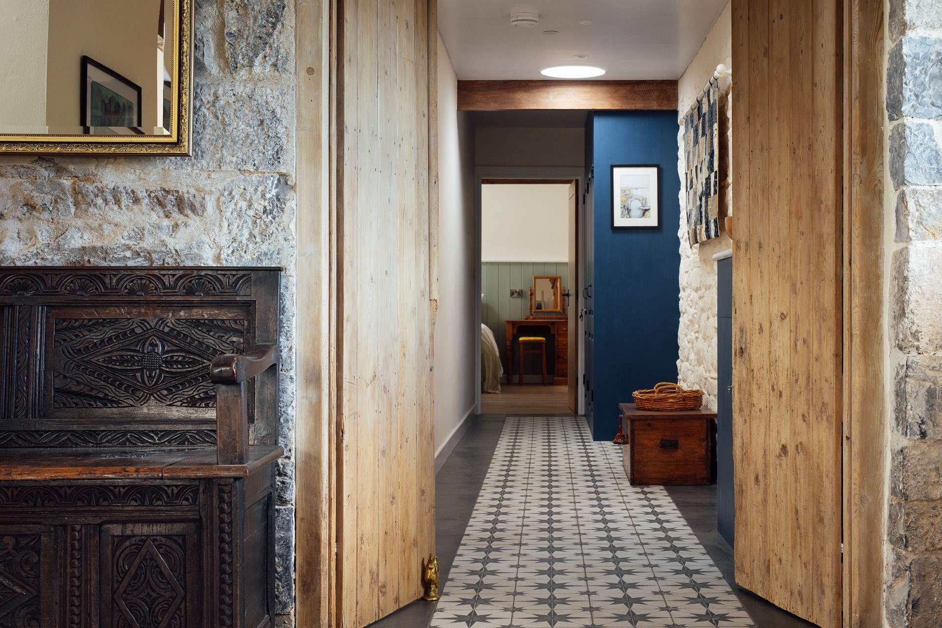 Wander down the stylish hallway to two inviting en suite bedrooms. 