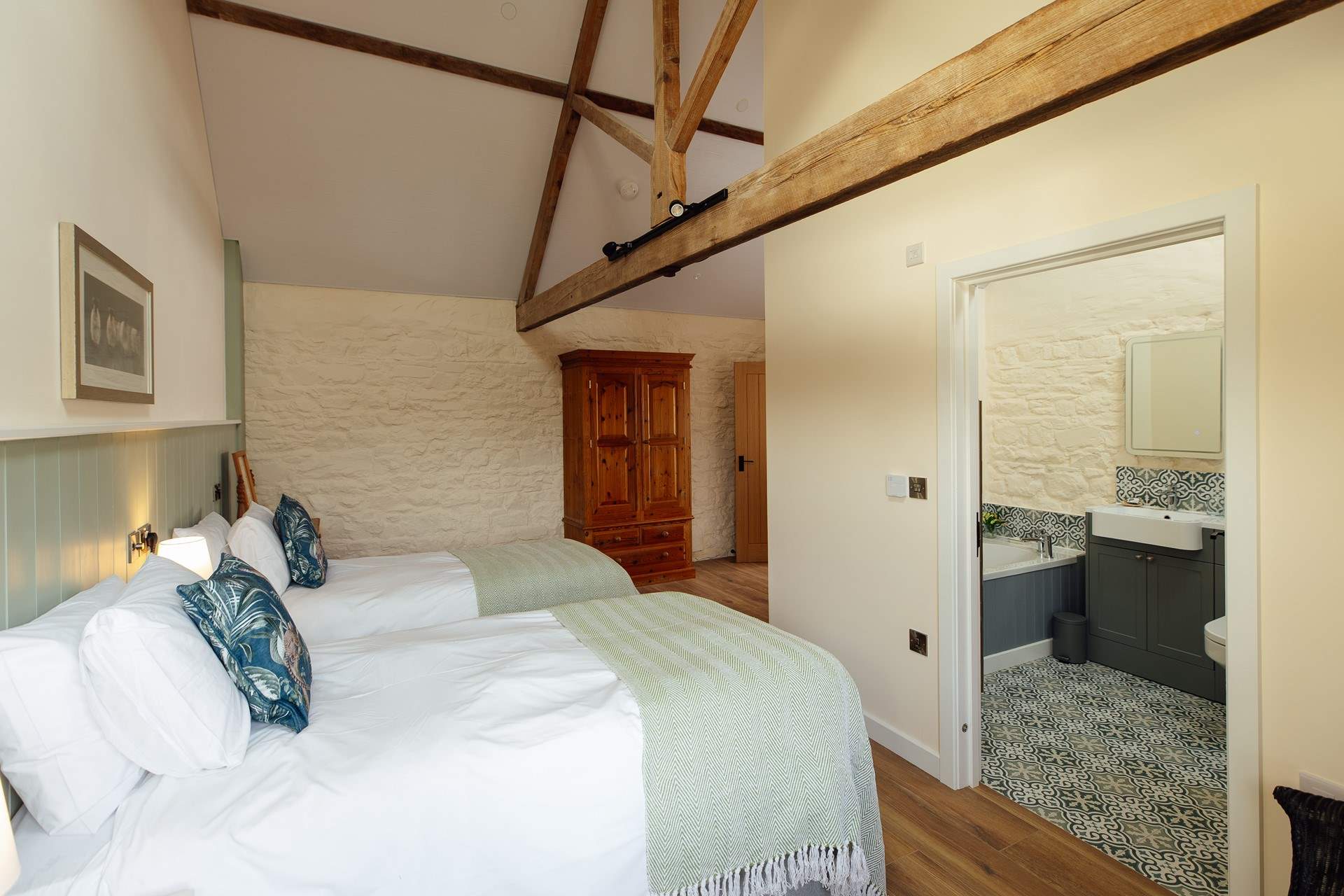 Jump into the comfortable beds, adorned with quality linen, after a luxurious soak in a bubbly bath. Holiday bliss. 