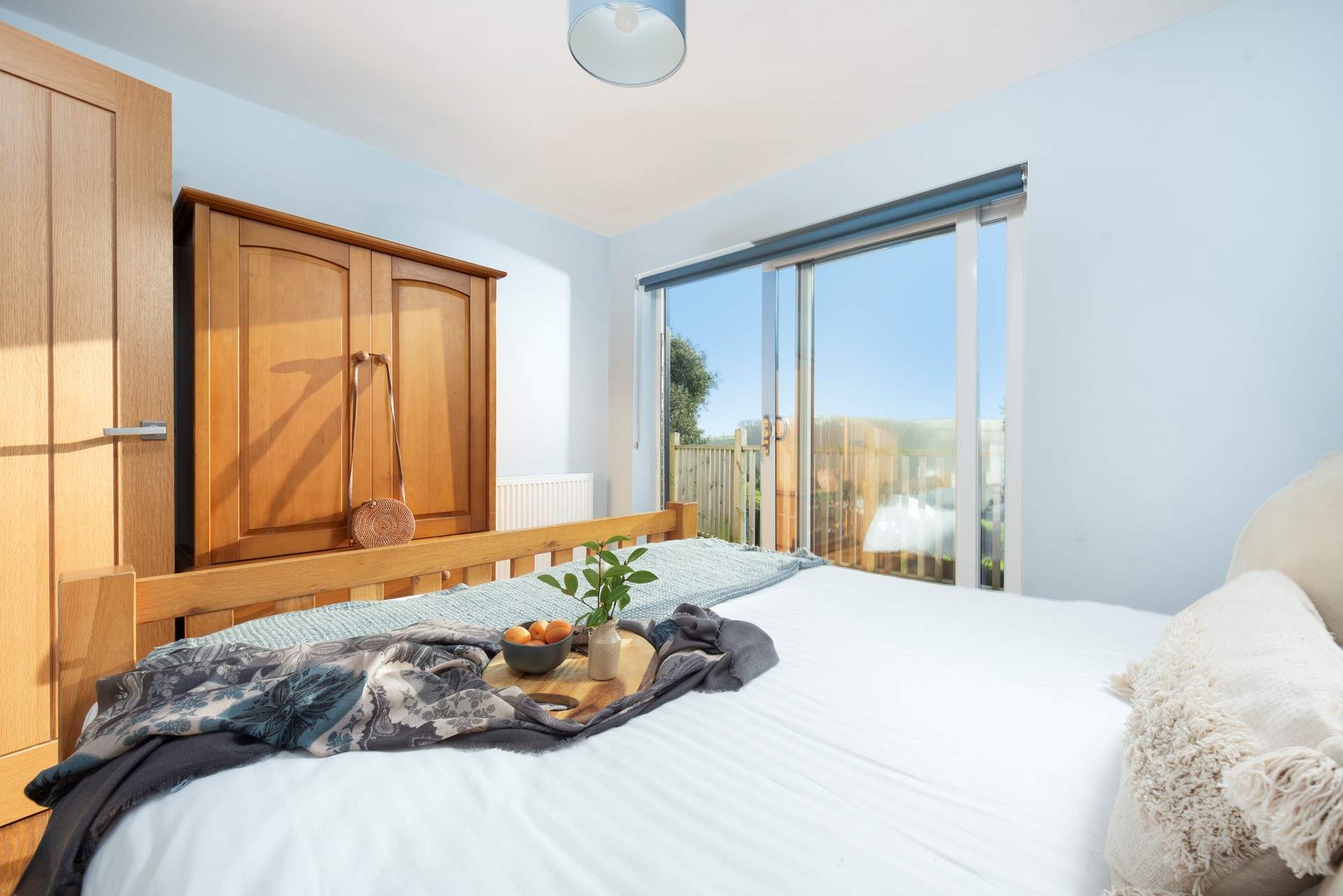 Bedroom 1 offers direct access to the decking .