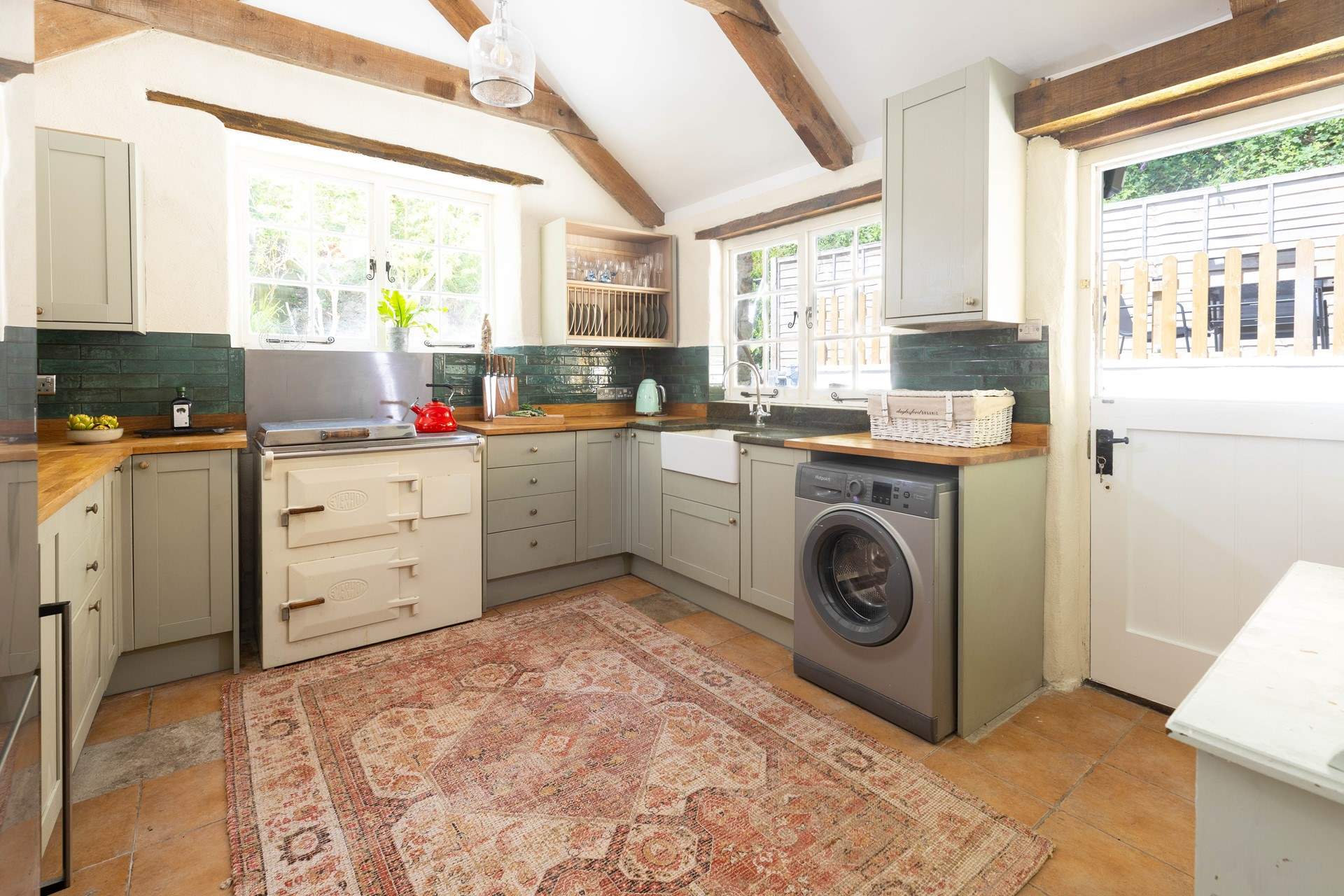 A classic farmhouse kitchen with a stable-door out to the patio/garden. 