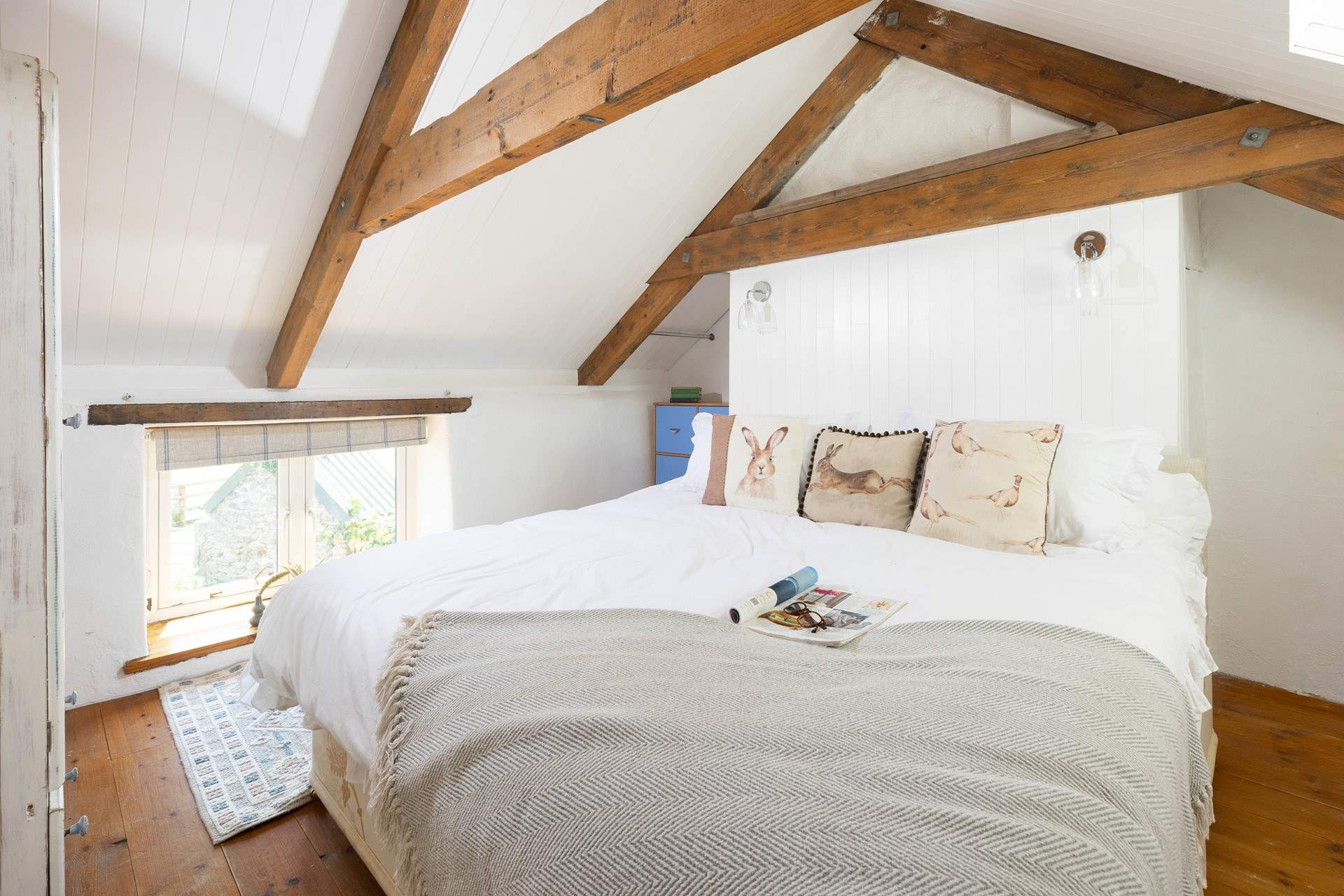 Both bedrooms are tucked in the eaves for a cosy night's slumber. 