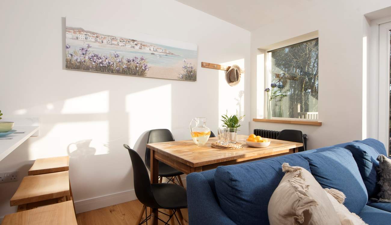 There's a choice of places to eat, at the breakfast-bar, at the dining-table or outside on the terrace.