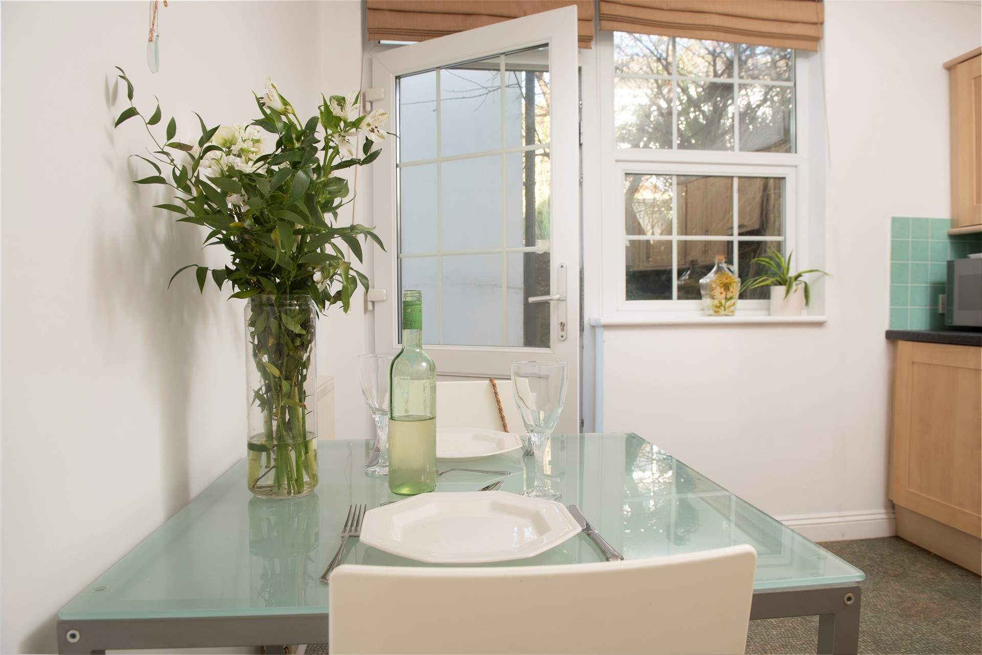 The entrance leads to the kitchen and dining area.