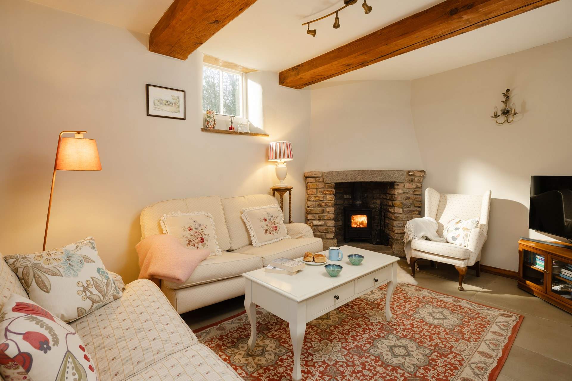 Snuggle up in front of the cosy wood-burner.