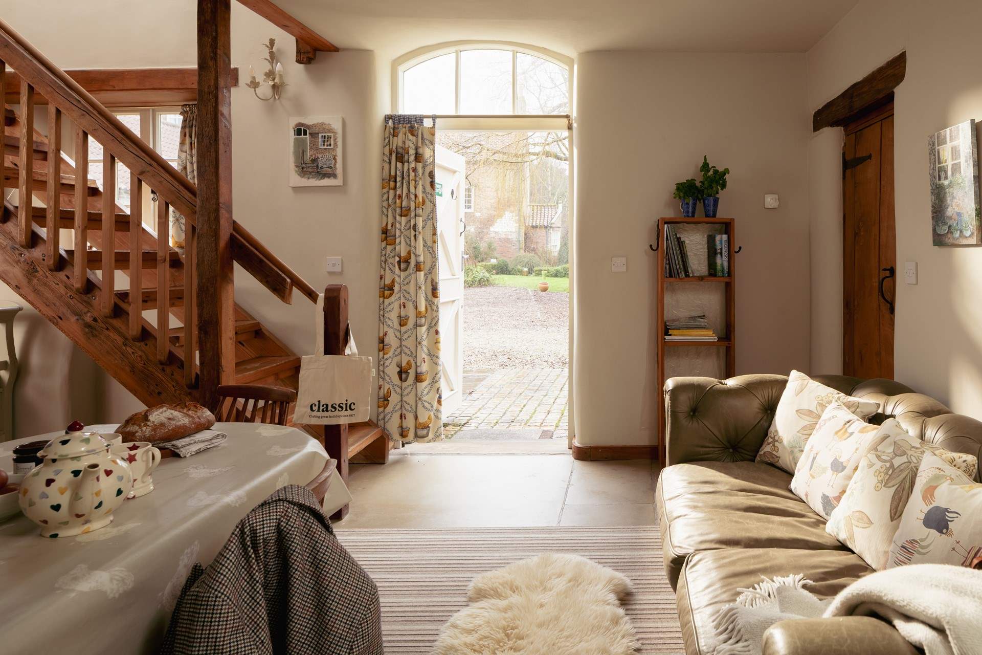 Enter into the spacious dining-area with comfy seating.