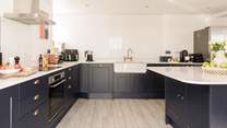 There is space for two chefs in this kitchen. Please note, the electric hob and oven have now been replaced with an electric range cooker.