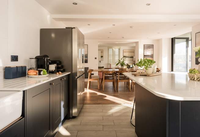 The bi-fold doors let the light flood through to this fabulous open plan room.