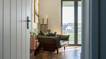 Looking into the open plan living-area from the entrance hall.
