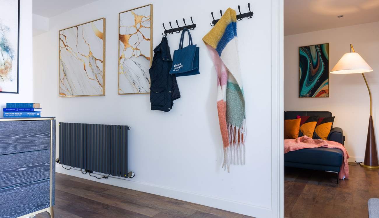 The entrance hall runs through the middle of the house.