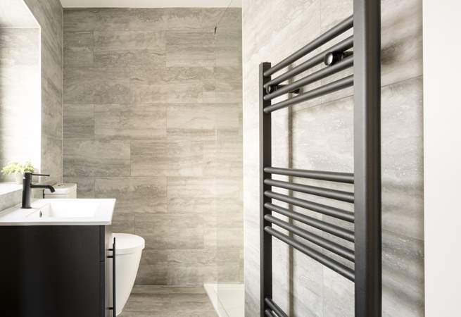 A stylish en suite shower-room with heated towel rail.