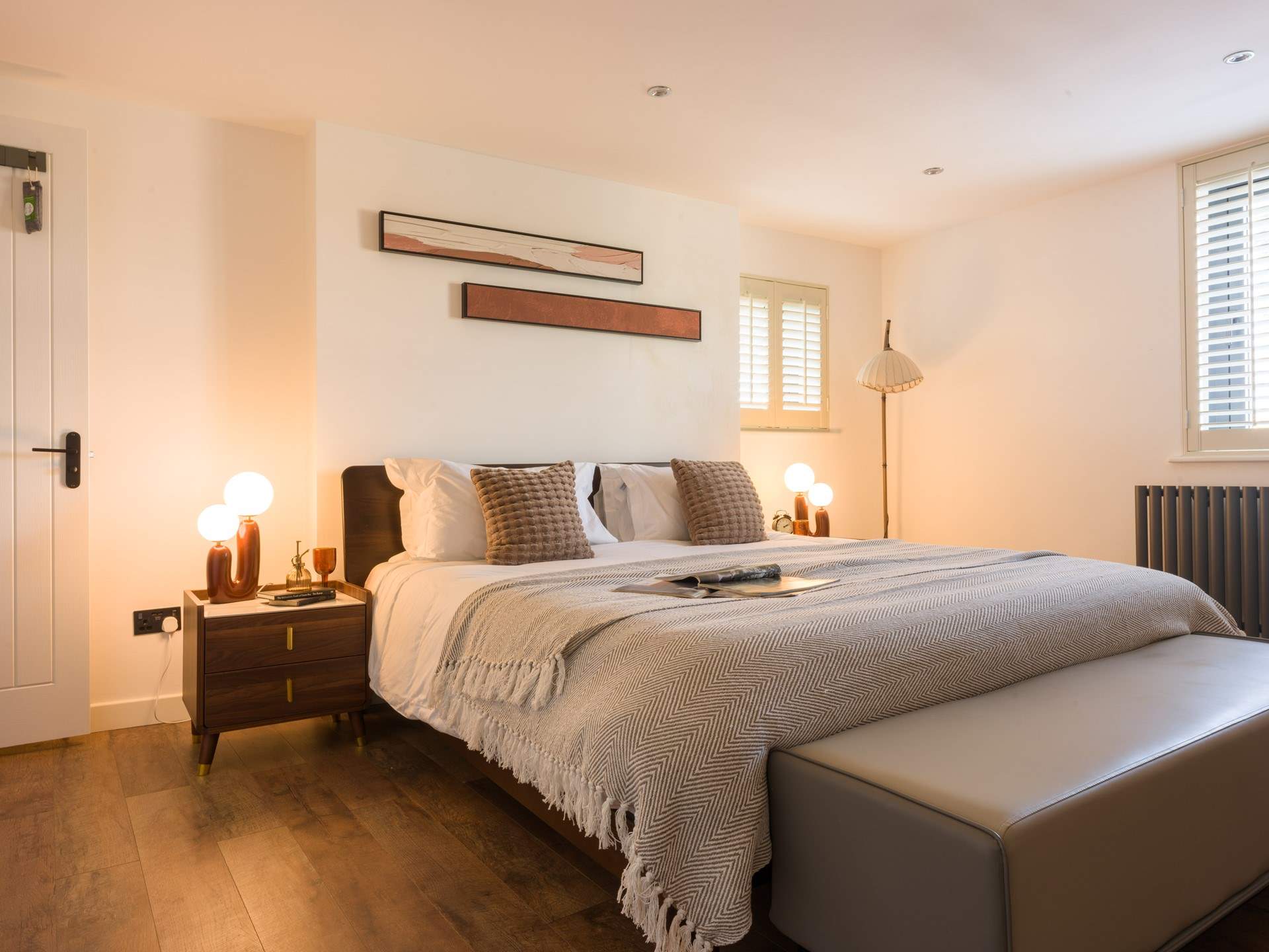 Head across to bedroom 4 that offers warming tones and relaxation.