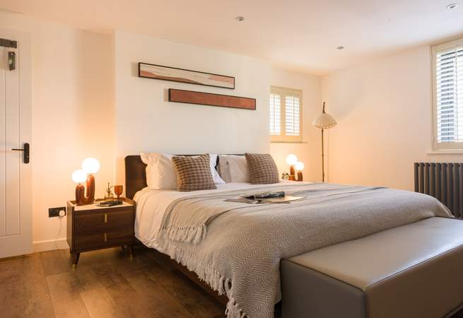 Head across to bedroom 4 that offers warming tones and relaxation.