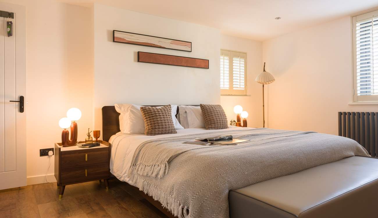 Head across to bedroom 4 that offers warming tones and relaxation.