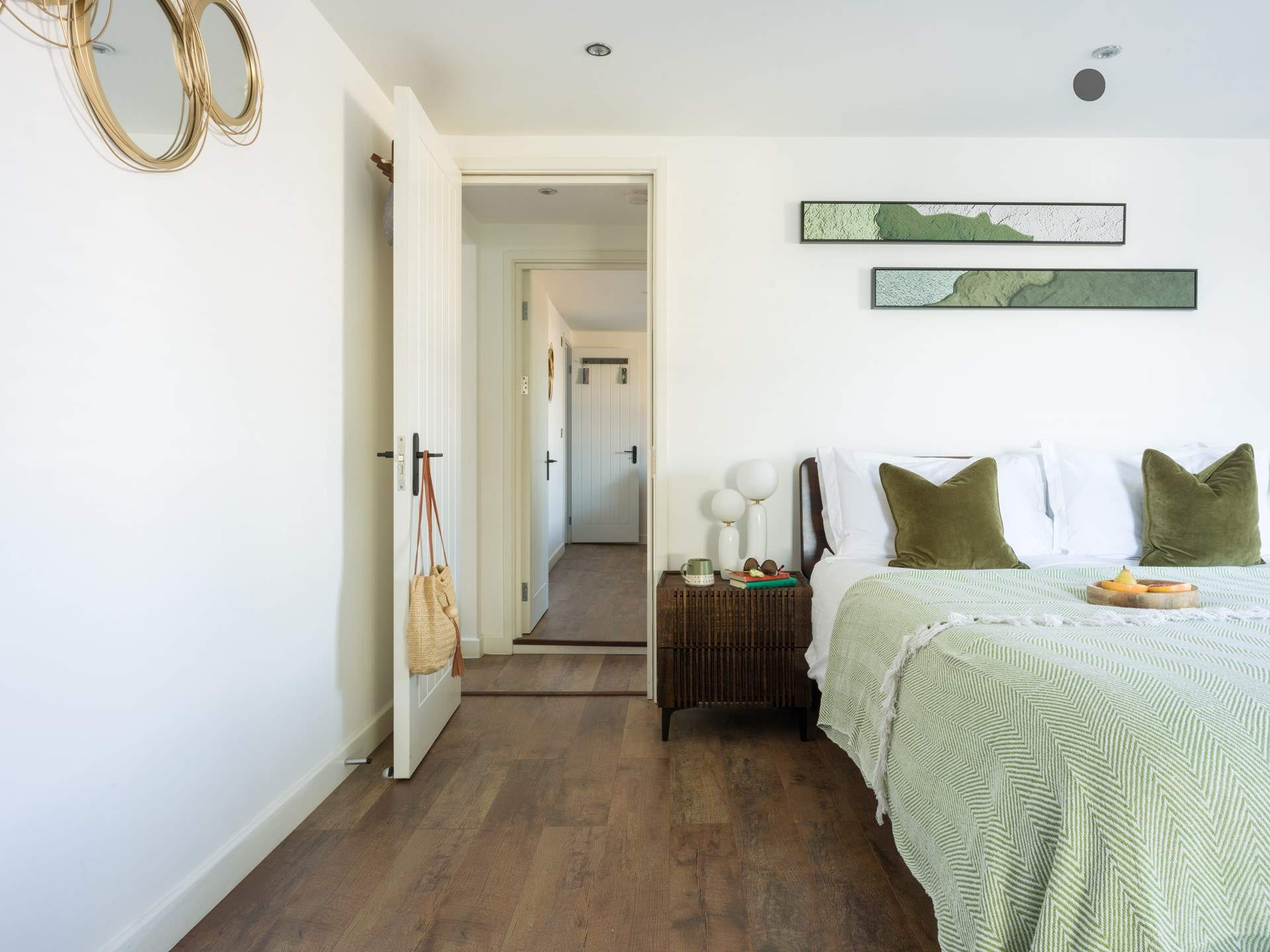 Bedroom 3 with views, access to the shared balcony and an en suite shower-room.