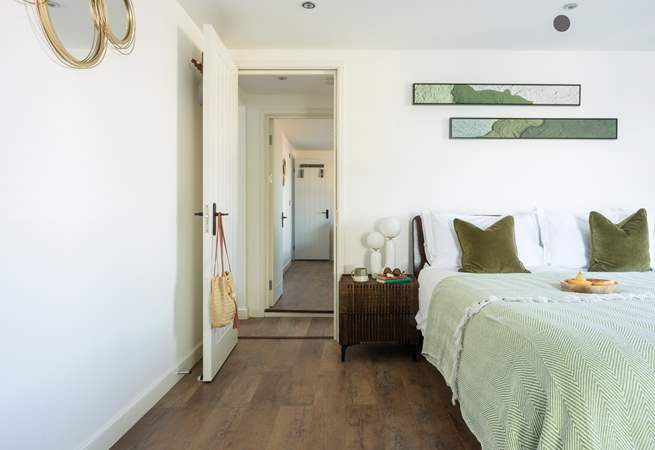 Bedroom 3 with views, access to the shared balcony and an en suite shower-room.