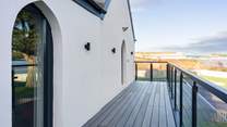 The balcony will have seating so you can relax and take in the views.