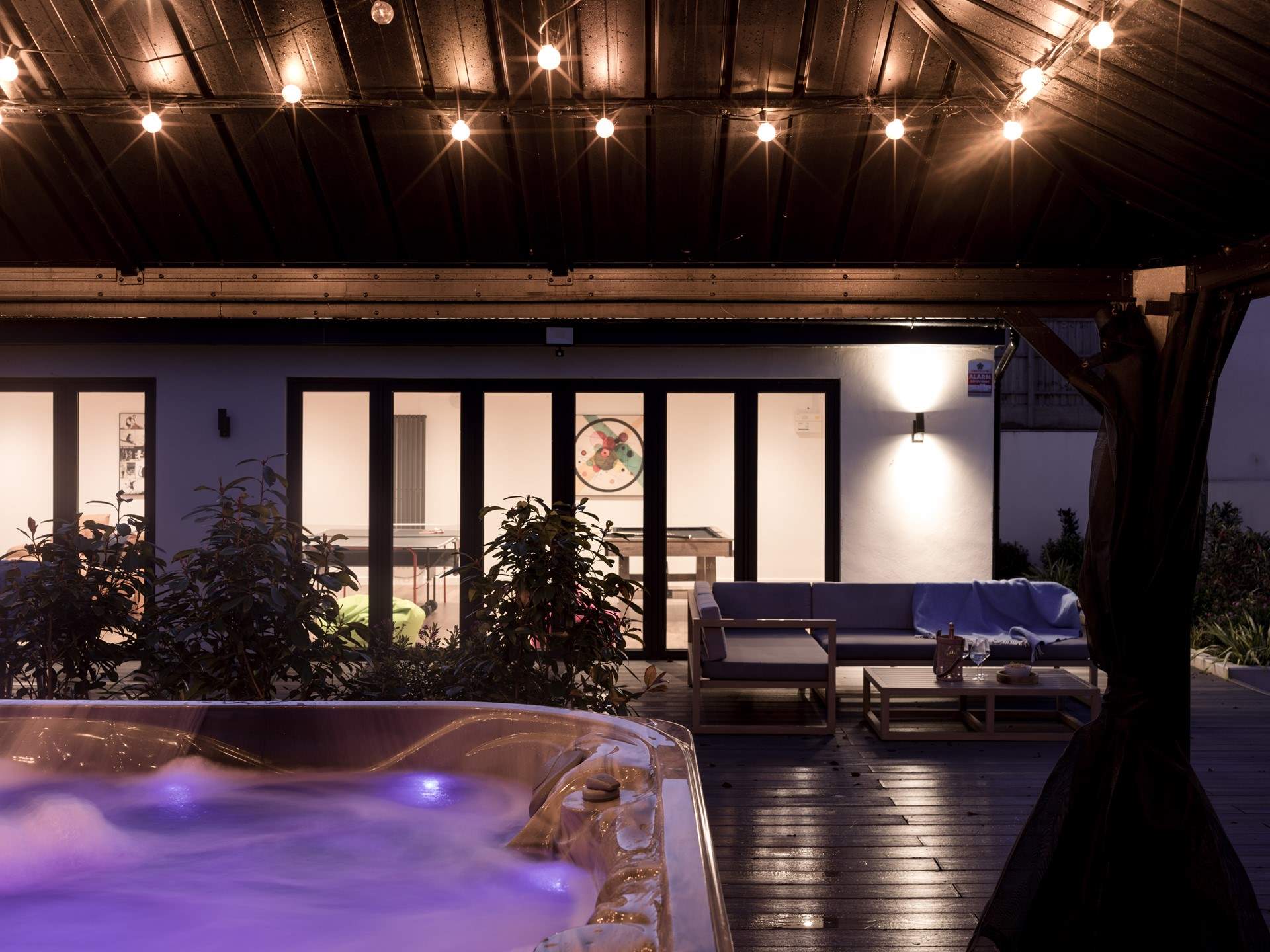 With a covered hot tub and games-room this is a destination retreat.