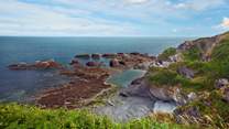 Walk the miles and miles of coast path.