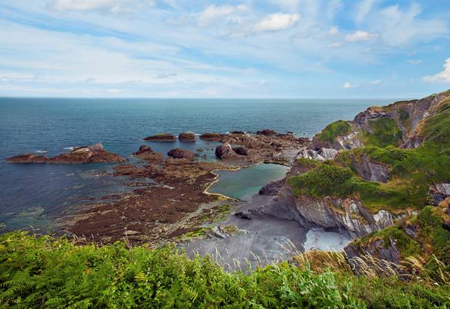 Walk the miles and miles of coast path.