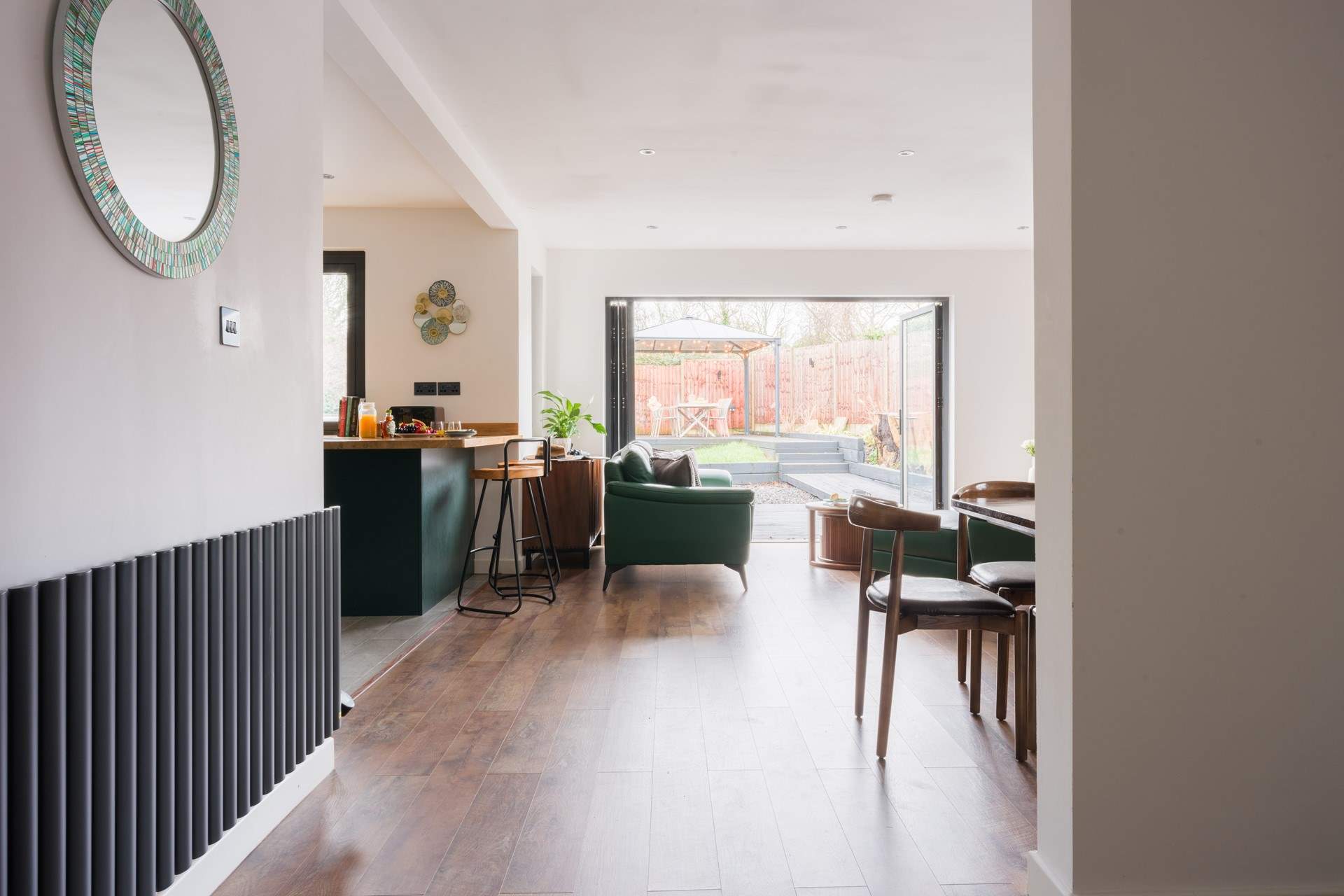 Open the bi-fold doors and enjoy the the garden with glimpses of the estuary.