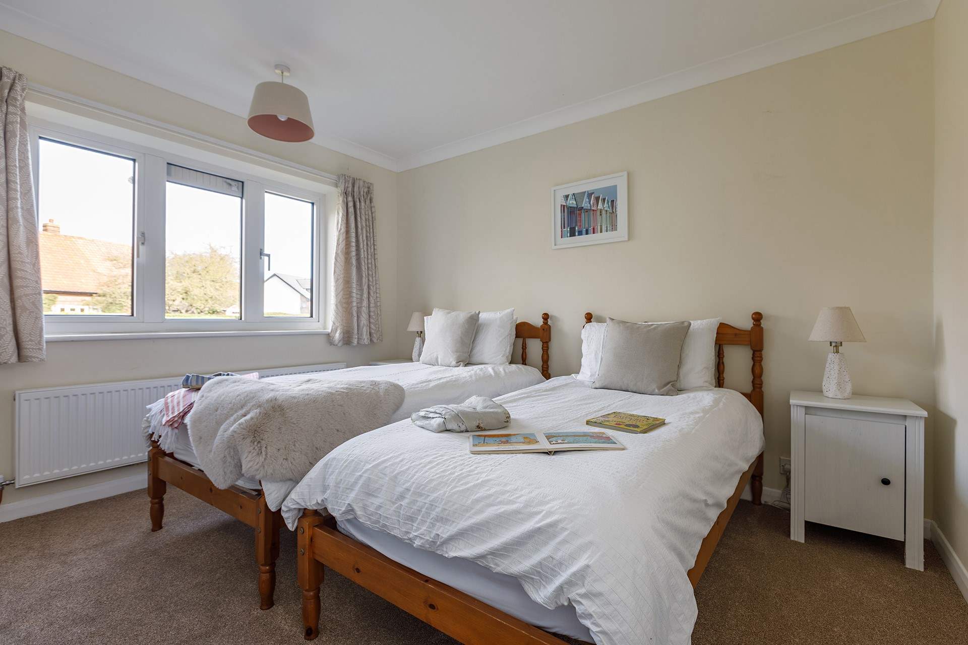 A welcoming twin bedroom; perfect for adults or children